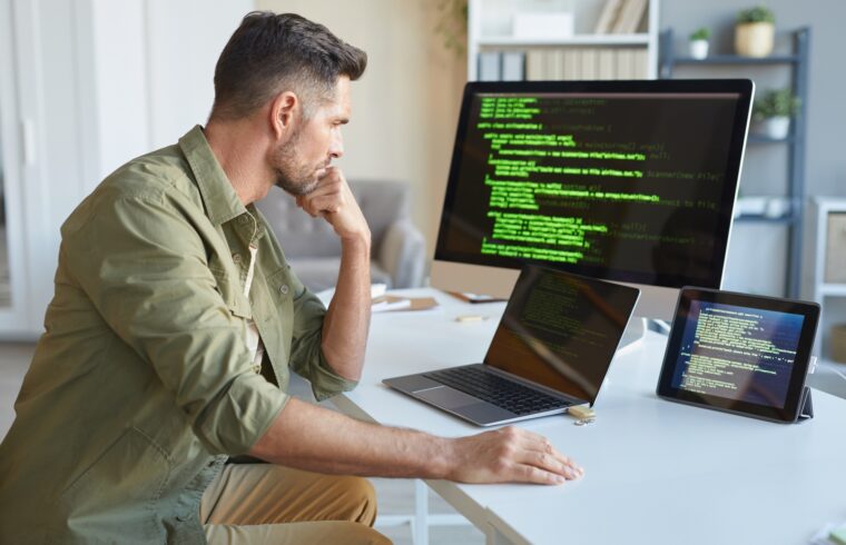 Computer technician installing software