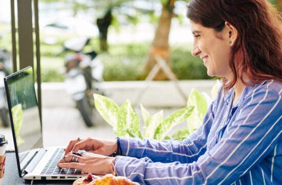 Freelance woman answering e-mails